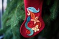 handmade felt ornament shaped like a christmas stocking