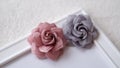 Handmade flowers made out of fabric in beautiful colors