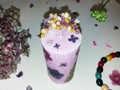 Handmade flower soy candles with herbs and crystals