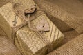 Handmade gift box with a natural rope and two wooden hearts on sackcloth, Valentines Day background