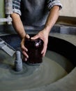 Handmade glass polishing in traditional glass factory