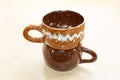 handmade glazed clay mugs made according to the master class Royalty Free Stock Photo