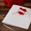 Handmade greetings card with crochet red heart for Saint Valenti Royalty Free Stock Photo