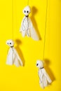 Handmade halloween craft decor, paper ghosts background