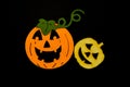 Handmade Halloween pumpkins isolated on black background. Sponge and wood pumpkins. Royalty Free Stock Photo