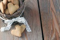 Handmade heart cookies for Valentine's day in a basket on a wood Royalty Free Stock Photo