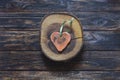 Handmade heart shape on wood slice