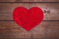 Handmade Heart on the wooden background.