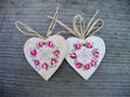 Handmade hearts on wooden background