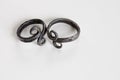 Handmade iron vintage rings with infinity symbol - selective focus/shallow depth of field