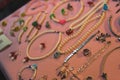 Handmade jewelry on a counter at sell fair