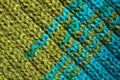Handmade knitted fabric blue and green wool background texture Royalty Free Stock Photo