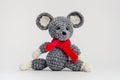 Handmade knitted mouse on a white background Royalty Free Stock Photo