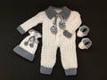 Handmade knitted newborn set, for baby boy. Royalty Free Stock Photo