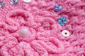 Handmade Knitted Pink Warm Sweater, macro. Background