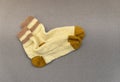 Handmade knitted yellow winter socks Royalty Free Stock Photo
