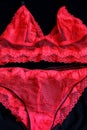 Handmade lace underwear. red lace lingerie, set of bra and Royalty Free Stock Photo