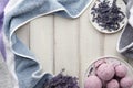 Handmade lavender bath bombs and flowers on white table Royalty Free Stock Photo