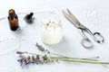 Handmade lavender scented candle with essential oil, flowers, wax and wicks Royalty Free Stock Photo