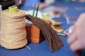 leather thread tassel craft DIY instrument tool. craftsman working desk