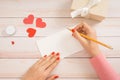 Handmade love card for valentine day on wooden background