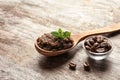 Handmade natural body scrub and coffee beans Royalty Free Stock Photo