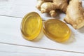 Handmade natural honey ginger soap on white wood background