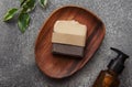 Handmade soap bar and green leaf Royalty Free Stock Photo