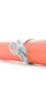 Handmade natural string knot tied on orange letter tube Royalty Free Stock Photo