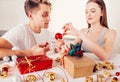 Handmade New Year decor presents couple in love making together Royalty Free Stock Photo