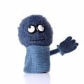 Handmade nice blueberry with hand in baby handsock toy with funny face. Generative AI Royalty Free Stock Photo