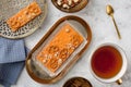 Handmade orange chocolate bar with cookies and hazelnuts