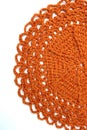 Handmade orange crochet doily Royalty Free Stock Photo