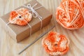 Handmade orange crochet flowers decoration of gift Royalty Free Stock Photo