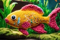 Handmade orange fish toy. Knitted kid soft toy made yarn on an artificial water bottom