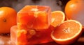 Handmade orange soap with fresh oranges and leaves on wooden background. Atmospheric beautiful spa background