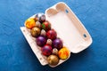 Handmade painted Easter eggs in egg box Royalty Free Stock Photo