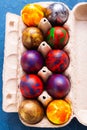 Handmade painted Easter eggs in egg box Royalty Free Stock Photo