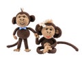 Handmade pair of monkeys on white background