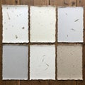Handmade paper with deckled edges are arranged in a 3x2 grid on a Royalty Free Stock Photo
