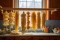 handmade pasta drying on a rack