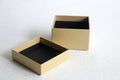 A handmade pasteboard box on a white textural background Royalty Free Stock Photo