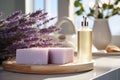 Handmade pastel purple lavender soap in white sunny bathroom. Home made spa, skincare and cosmetology concept