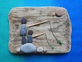 fisher mans picture using sea wood, stones and glass, Lithuania