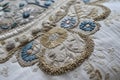 handmade pillow, with intricate and delicate embroidery and stitches