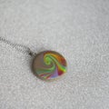 Handmade polymer clay necklace pendant rainbow swirl