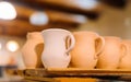 Handmade pottery in a pottery workshop - very shallow depth of field