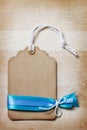 Handmade Price Tag with Blue Ribbons Royalty Free Stock Photo