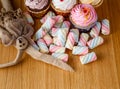 Handmade rabbit doll with heap of sweets Royalty Free Stock Photo