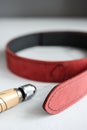 Handmade Red Leather Belt sewing with awl Royalty Free Stock Photo